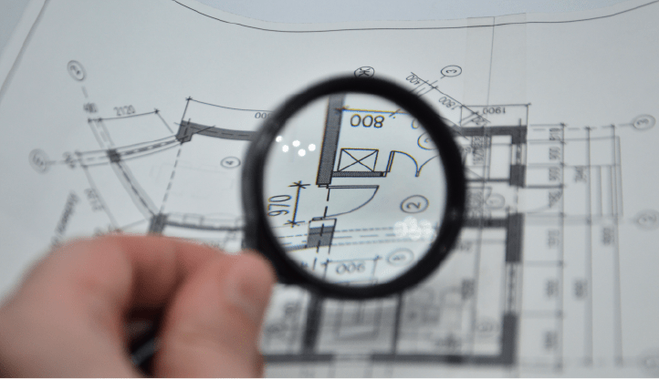 view through a magnifying glass of a detailed architectural drawing
